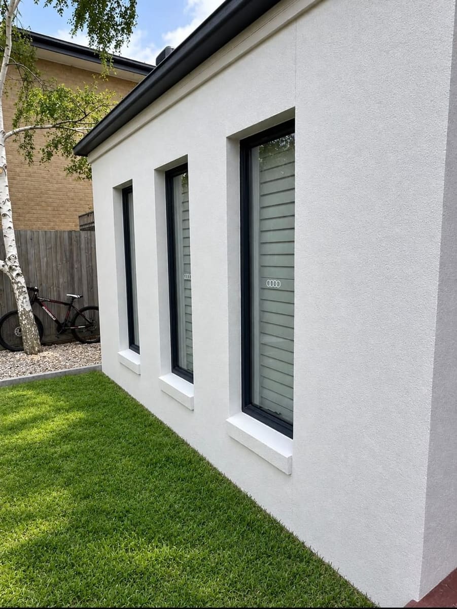 Pristine white acrylic rendered house facade by ZN Painting Services